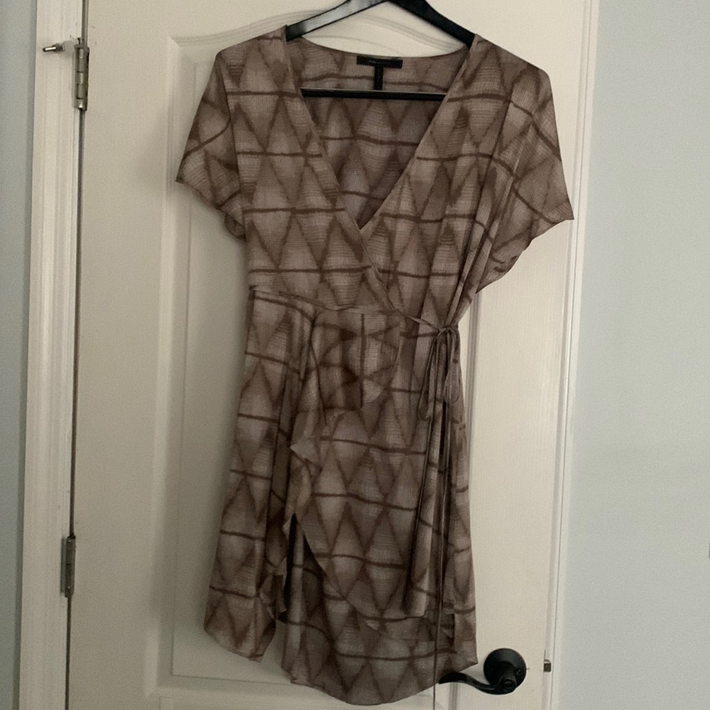 Beautiful silky BCBG Maxazria low cut high low dress.
